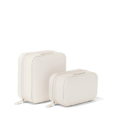 Dagne Dover Small and Large Frankie Jewelry Cases in white standing next to one another.