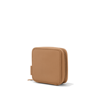 Dagne Dover small Arlo Tech Organizer in camel brown seen from an angle.