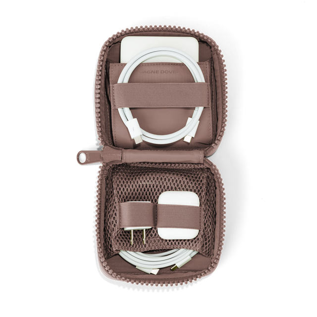 hover - Dagne Dover small Arlo Tech Organizer in pink unzipped, revealing the interior elastic loops and airmesh pockets.