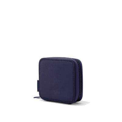 Dagne Dover small Arlo Tech Organizer in dark blue seen from an angle.