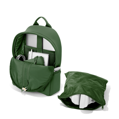 Dagne Dover medium Dakota Neoprene Backpack in a rich, classic forest green unzipped, showing the interior pockets and shoe bag. hover
