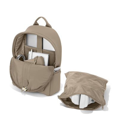 Dagne Dover medium Dakota Neoprene Backpack in khaki unzipped, showing the interior pockets and shoe bag. hover