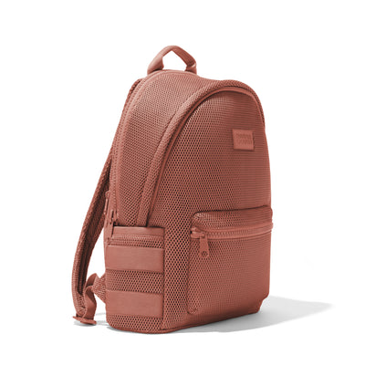 Dagne Dover large Dakota airmesh Backpack in pink seen from an angle.