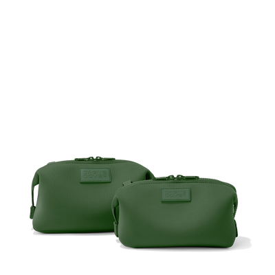 Dagne Dover Small and Large Hunter Toiletry Bags in a rich, classic forest green.
