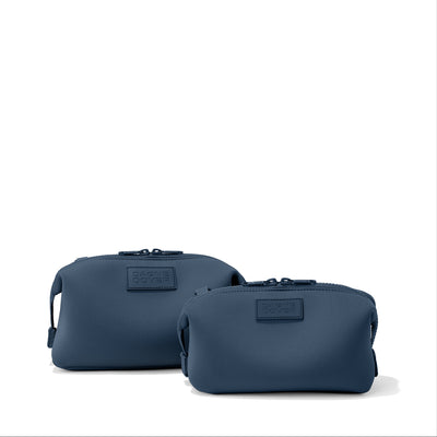 Dagne Dover Small and Large Hunter Toiletry Bags in moonlight blue.