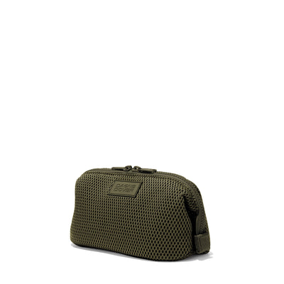 Dagne Dover Small Hunter Toiletry Bag in dark green air mesh seen from an angle.