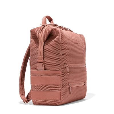 Dagne Dover Large Indi Diaper Backpack in dust pink air mesh seen from an angle.