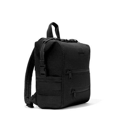 Dagne Dover Medium Indi Diaper Backpack in black air mesh seen from an angle.