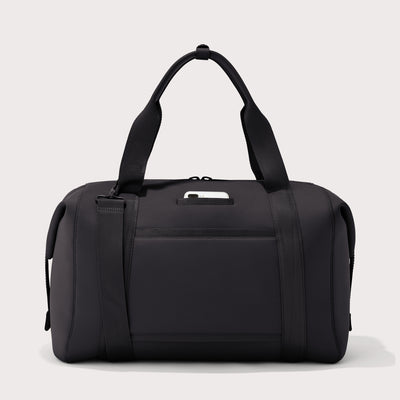 Extra large Landon Carryall in black, displaying an exterior phone pocket