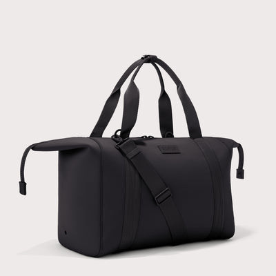 Extra large Landon Carryall in black with zippers unbuckled