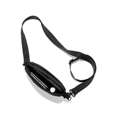 Dagne Dover Mara Phone Sling unzipped in blackd air mesh seen from above, exposing the interior card slots.