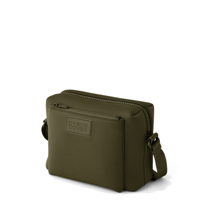 Dagne Dover Micah crossbody in dark green seen from an angle.