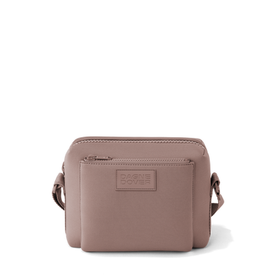 Dagne Dover Micah Crossbody in pink seen without the adjustable shoulder strap.