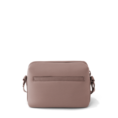 Dagne Dover Micah Crossbody in pink seen from the back.