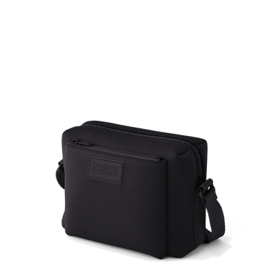 Dagne Dover Micah crossbody in black seen from an angle.