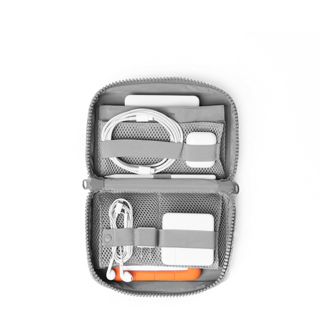 hover - Dagne Dover large Arlo Tech Organizer in grey unzipped, revealing the interior elastic loops and airmesh pockets.