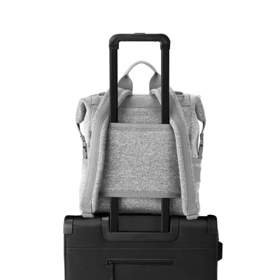 Dagne Dover Medium Indi Diaper Backpack in heather grey showing the neoprene luggage sleeve.