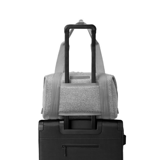 Medium Landon Carryall in grey displaying luggage sleeve