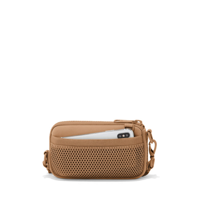 Dagne Dover Mara Phone Sling in camel brown showing the exterior air mesh slip.