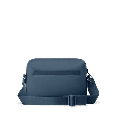 Dagne Dover Micah Crossbody in moonlight blue seen from the back.