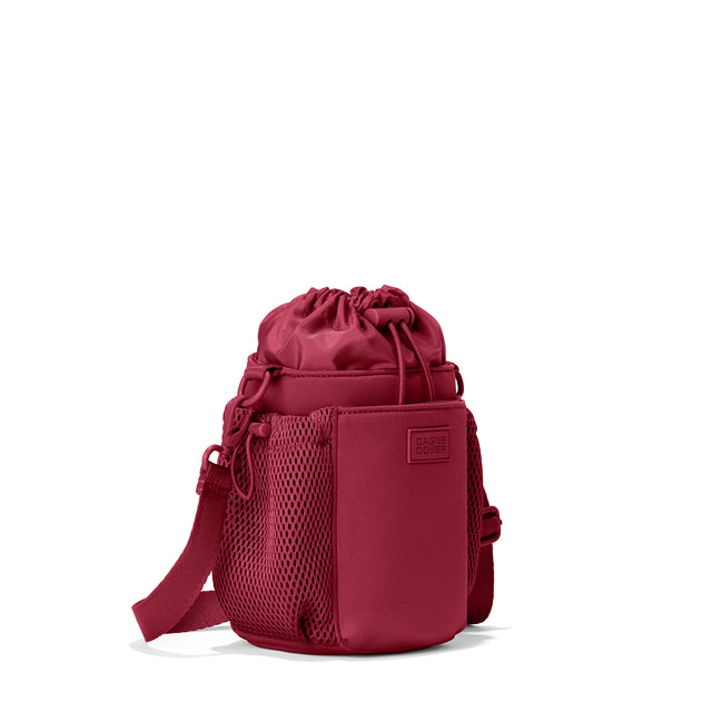 Dagne Dover Sloan Water Bottle Sling in a punchy, saturated deep red seen from an angle.