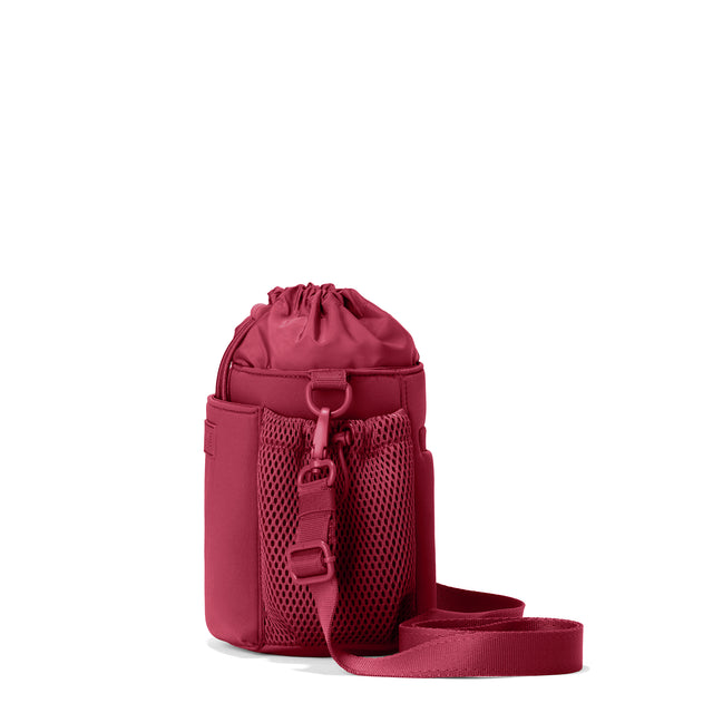 Dagne Dover Sloan Water Bottle Sling in a punchy, saturated deep red seen from the side.