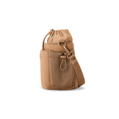 Dagne Dover Sloan Water Bottle Sling in camel brown seen from the side.