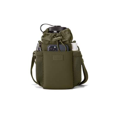 Dagne Dover Sloan Water Bottle Sling in a deep olive green containing a water bottle and accessories.