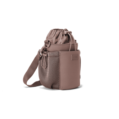 Dagne Dover Sloan Water Bottle Sling in a muted mauve seen from an angle.