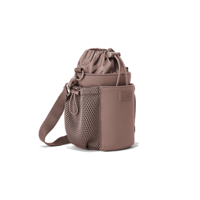 Dagne Dover Sloan Water Bottle Sling in a muted mauve seen from an angle.