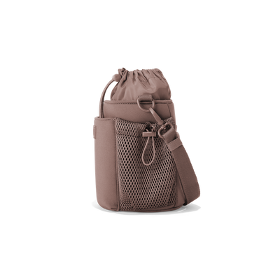 Dagne Dover Sloan Water Bottle Sling in a muted mauve seen from the side.