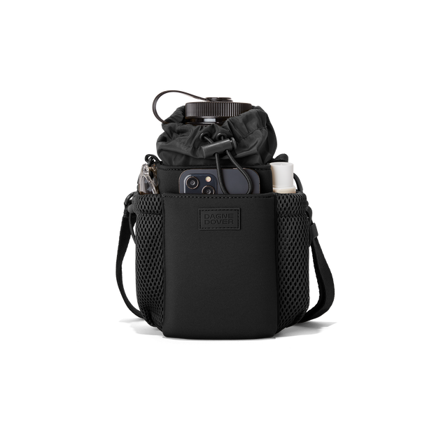 Dagne Dover Sloan Water Bottle Sling in black containing a water bottle and accessories.