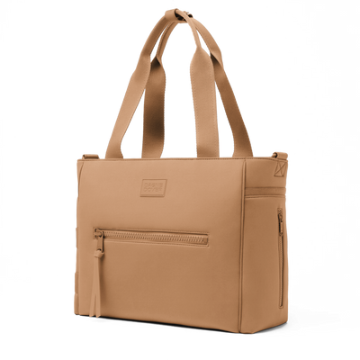 Dagne Dover large Wade Diaper Tote in camel brown seen from an angle.