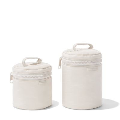 Dagne Dover small and large Mila Toiletry Pouches in white.