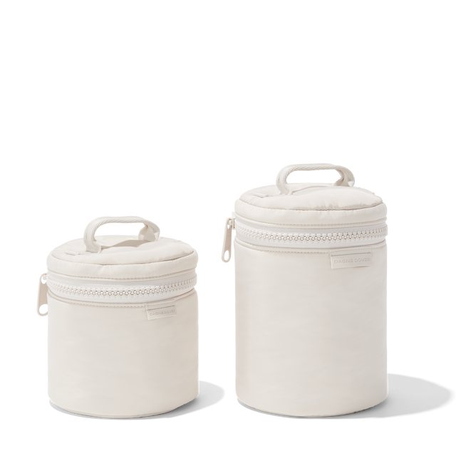 Dagne Dover small and large Mila Toiletry Pouches in white.