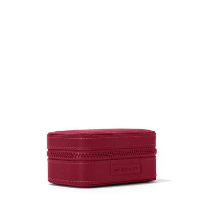 Dagne Dover Small Frankie Jewelry Case in a spice red seen from an angle.