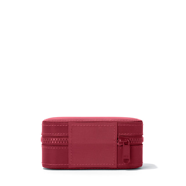 Dagne Dover Small Frankie Jewelry Case in a spice red seen from the back.