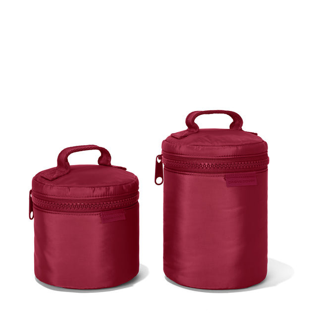 Dagne Dover small and large Mila Toiletry Pouches in spice red.