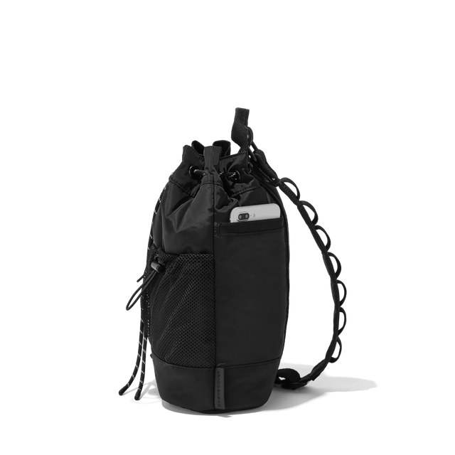 Dagne Dover Nova Sling Bag in black seen from the side.