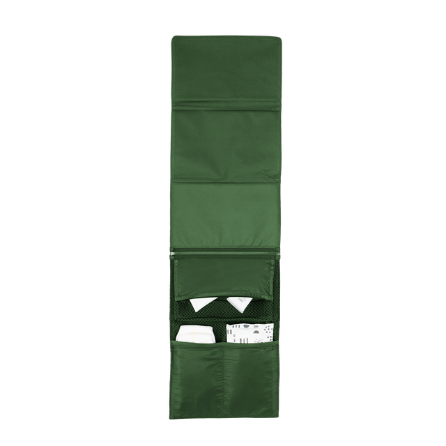 Dagne Dover Joey Changing Kit in a rich, classic forest green unfolded, revealing the detachable changing mat.
