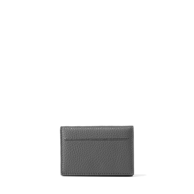 Dagne Dover Accordion Card Case in grey revealing the external card slot.