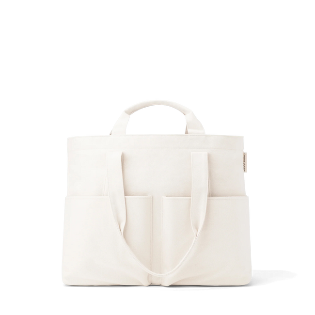 Meet the tote that changes with you. 