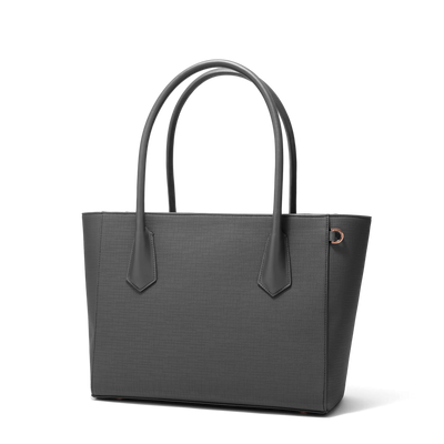 Dagne Dover Legend Signature Leather Tote in grey seen from an angle.