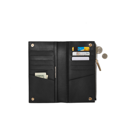 hover - Dagne Dover Slim Wallet in black unclasped, revealing ten card slots, two additional slip pockets, and four cash pockets.